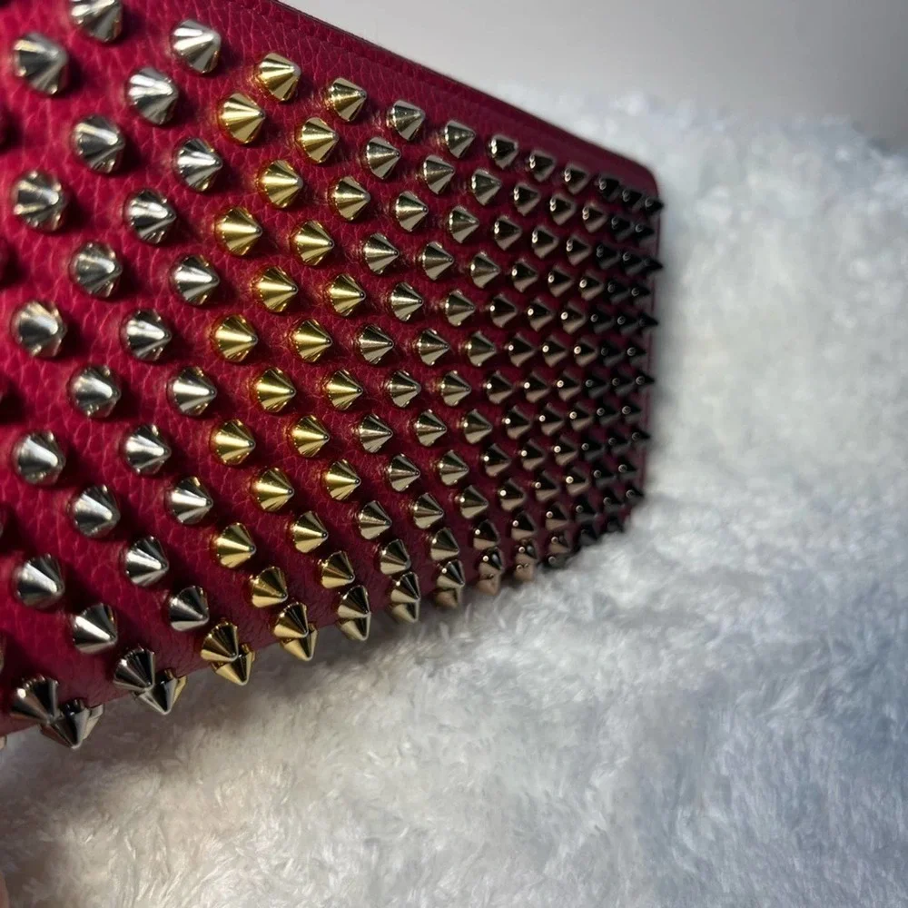 Christian Louboutin Zip Around Panetone Studded wallet in Wine Color, Leather
